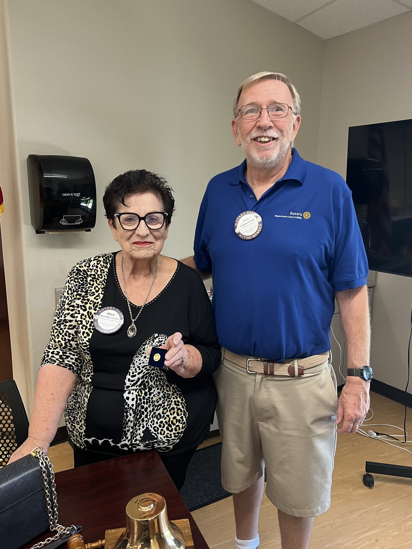 Della Condon and President Doug Emery display Della's Paul Harris Fellow recognition